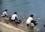 women at water